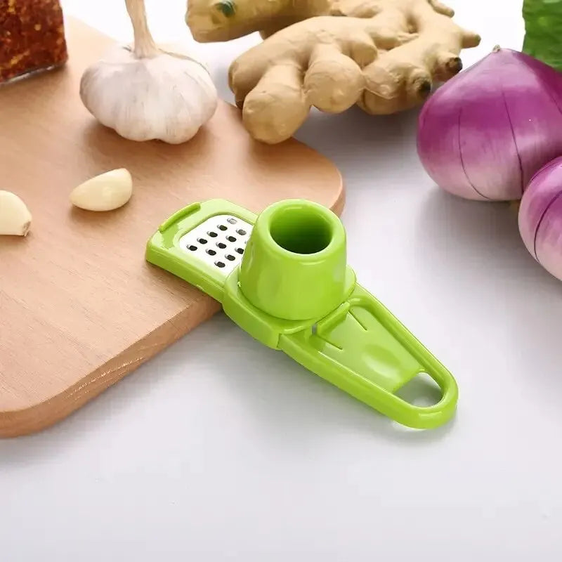 Mini Picadora de Ajo Manual – Prensa de Ajo Creativa, Triturador de Ajo Portátil, Utensilio de Cocina Verde Práctico y Funcional (1 Unidad)