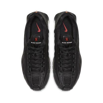 The Black Nike Shox TX4